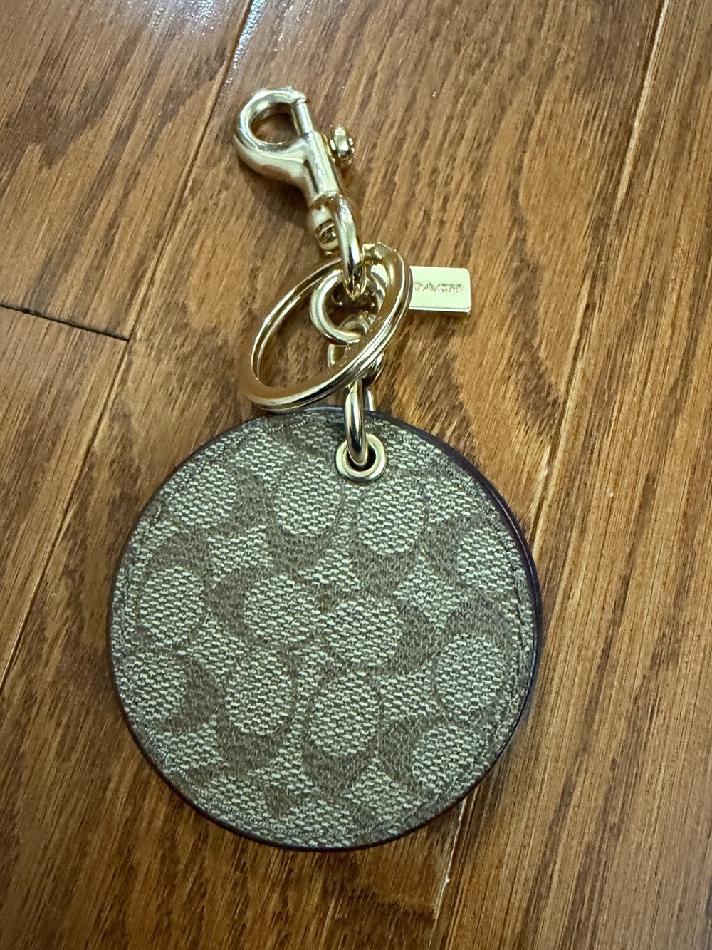 Coach Gold Signature Circle Mirror Keychain